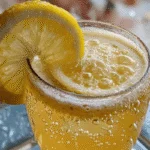 Lemon and apple cider water in a glass