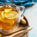 Natural Mounjaro Recipe for weight loss featuring water, lemon, honey, and ginger.